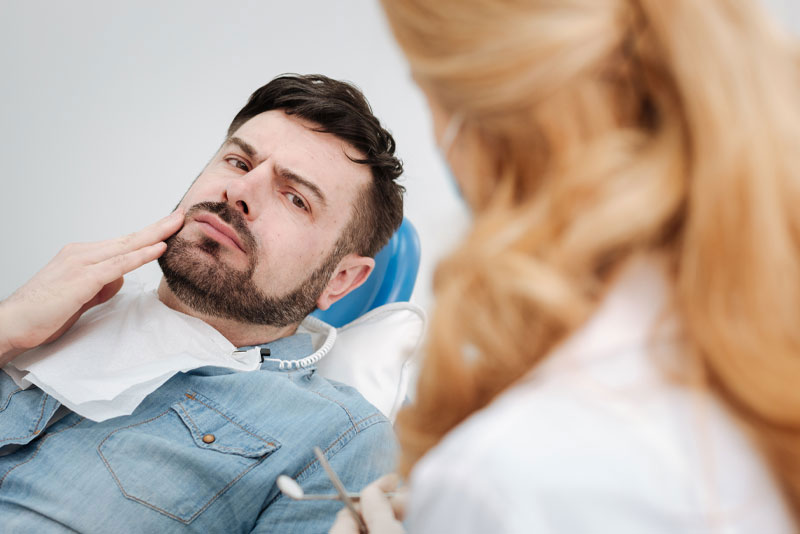 dental patient with tooth pain 3 flipped
