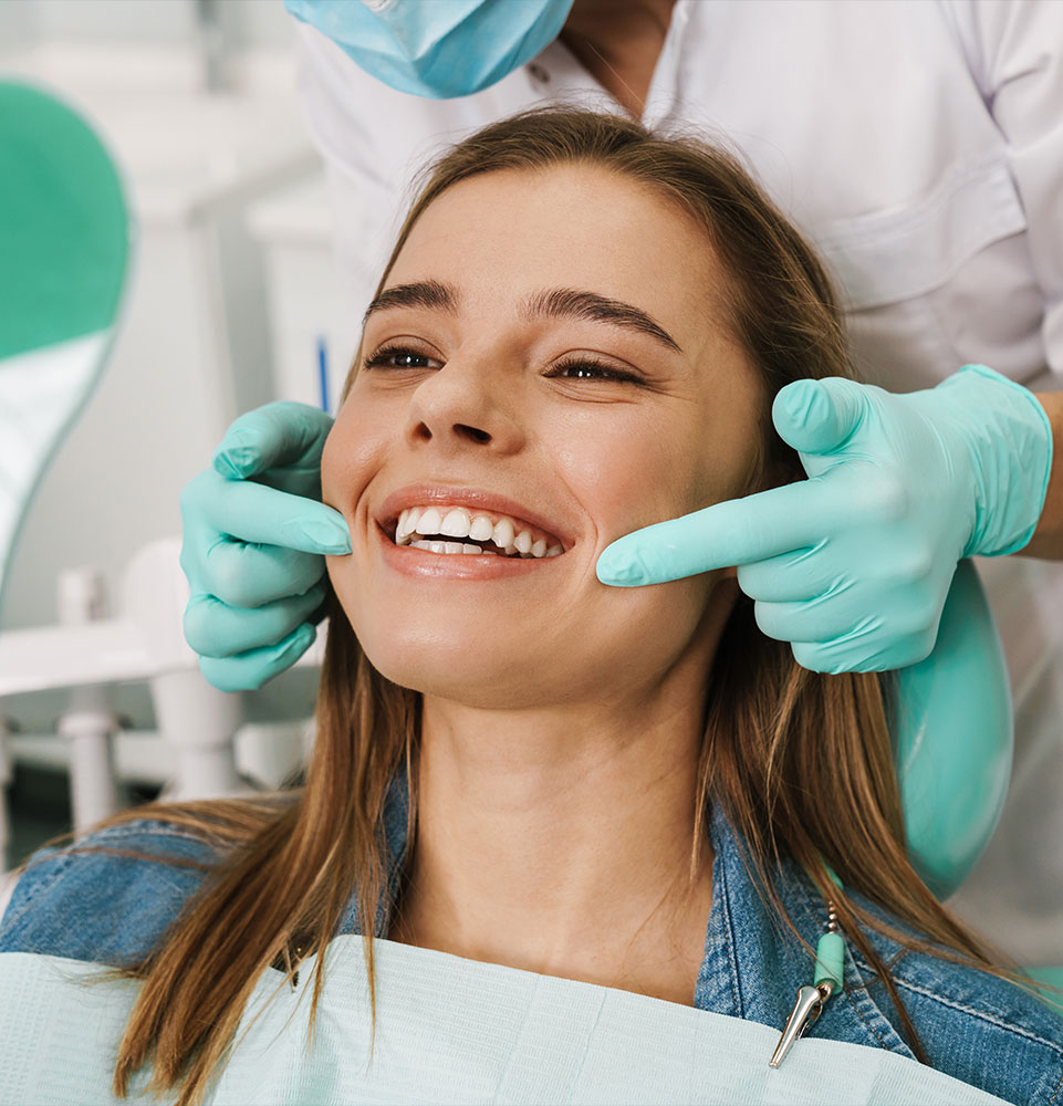 patient smiling after their dental procedure