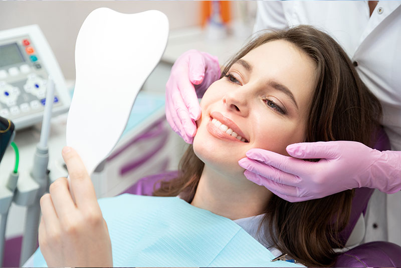 patient smiling after their dental procedure