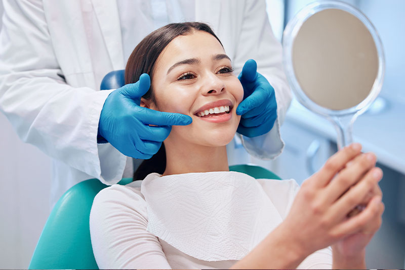paitent smilign after their dental procedure